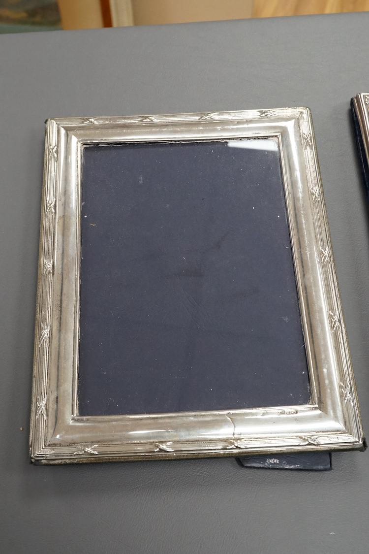 Two modern silver mounted rectangular photograph frames, including Britannia standard, by M&LS, London, 1989 and Keyford Frames Ltd, London, 1988, largest 26.1cm. Condition - poor to fair